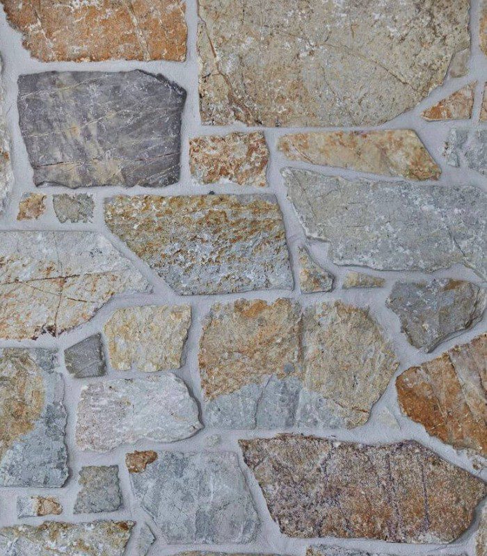 A close up shot of Peninsula Random Ashlar Quartz Limestone for walls.