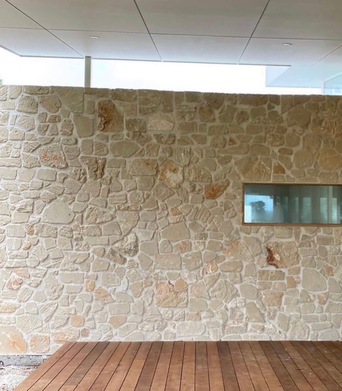 Oyster Limestone as an interior wall with a window in its centre.