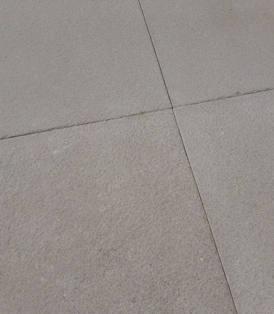 Four pieces of Kallos Limestone without grout.