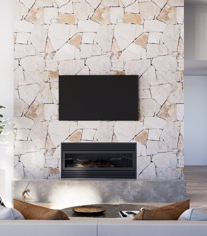 Loft Irregular Tumbled Sandstone installed as walling behind a fireplace and TV.